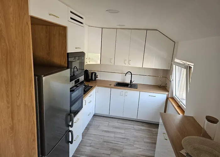 Nad Jeziorem Holiday home Milki